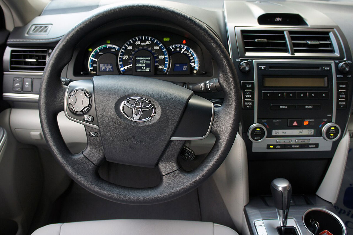 Interior view of the instrument and control panels of the 2012 Toyota Camry Hybrid LE